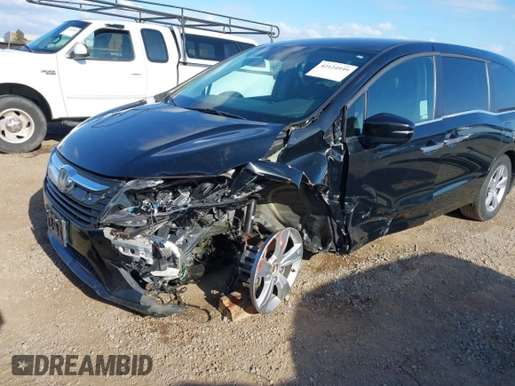 2019 Honda Odyssey EX with VIN 5FNRL6H54KB036540, listed as a IAAI auction lot 42124939 with 135,417 mi miles. Bid and sale history available at carsss.com. Image 6.