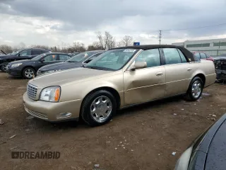 2005 Cadillac DeVille with VIN 1G6KD57Y35U242340, listed as a Copart auction lot 50558795 with 76,856 mi miles and Salvage Title. Bid and sale history available at carsss.com. Image 1.