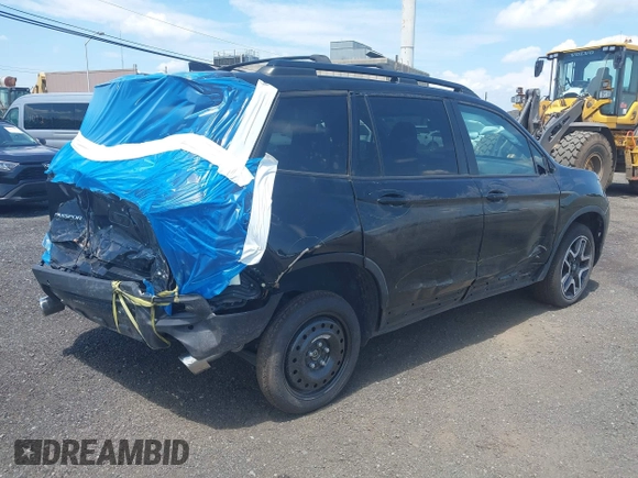 2023 Honda Passport Elite with VIN 5FNYF8H01PB030270, listed as a IAAI auction lot 42667744 with 7,931 mi miles and . Bid and sale history available at DreamBid. Image 4.