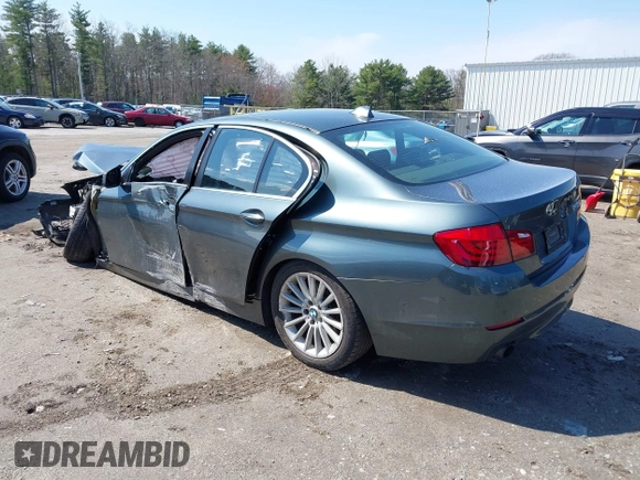 2011 BMW 5 Series 535i xDrive with VIN WBAFU7C56BC771267, listed as a IAAI auction lot 42006086 with 123,249 mi miles. Bid and sale history available at carsss.com. Image 3.