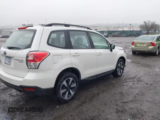 2017 Subaru Forester with VIN JF2SJABC7HH591087, listed as a IAAI auction lot 41858995 with Not Provided miles and . Bid and sale history available at DreamBid. Image 4.