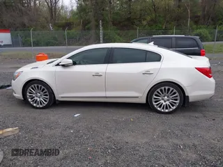 2014 Buick LaCrosse Premium II with VIN 1G4GF5G31EF234190, listed as a IAAI auction lot 42017022 with 125,376 mi miles. Bid and sale history available at carsss.com. Image 14.
