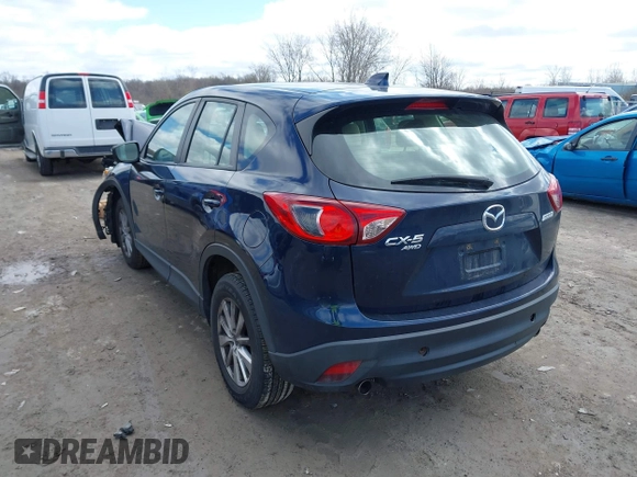 2015 Mazda CX-5 Sport with VIN JM3KE4BY3F0503011, listed as a IAAI auction lot 41973501 with 191,064 mi miles and . Bid and sale history available at carsss.com. Image 3.