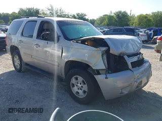 2007 Chevrolet Tahoe LT z VIN 1GNFC13087R253485, wystawiony jako IAAI lot #42220981 z przebiegiem 242 251 mil mil oraz . Historia ofert i sprzedaży dostępna na DreamBid. Obrazek 1.