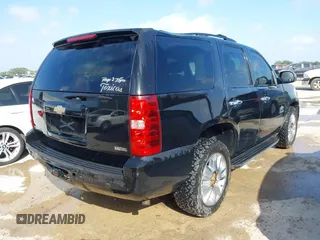2011 Chevrolet Tahoe LS with VIN 1GNSCAE05BR380084, listed as a IAAI auction lot 42746873 with 386,755 mi miles and . Bid and sale history available at DreamBid. Image 4.