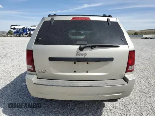 2007 Jeep Grand Cherokee Laredo z VIN 1J8GR48K17C596514, wystawiony jako Copart lot #54404755 z przebiegiem 230 033 mil mil oraz Szkoda całkowita • Salvage title. Historia ofert i sprzedaży dostępna na DreamBid. Obrazek 6.