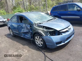 2009 Honda Civic LX z VIN 2HGFA165X9H501407, wystawiony jako IAAI lot #42029247 z przebiegiem 96 263 mil mil oraz . Historia ofert i sprzedaży dostępna na DreamBid. Obrazek 1.