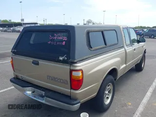 2001 Mazda B-Series Truck DS with VIN 4F4YR16U01TM10037, listed as a IAAI auction lot 42175718 with 190,115 mi miles and . Bid and sale history available at DreamBid. Image 4.