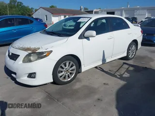 2010 Toyota Corolla with VIN 1NXBU4EEXAZ218218, listed as a IAAI auction lot 41967629 with 228,754 mi miles. Bid and sale history available at carsss.com. Image 2.