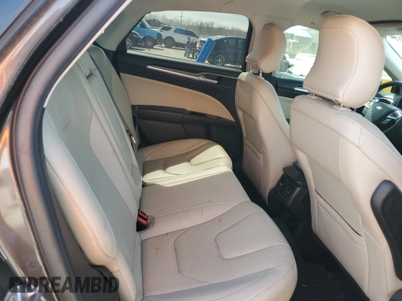 2016 Ford Fusion Titanium with VIN 3FA6P0D9XGR406186, listed as a Copart auction lot 50601175 with 207,220 mi miles and Salvage title. Bid and sale history available at DreamBid. Image 10.