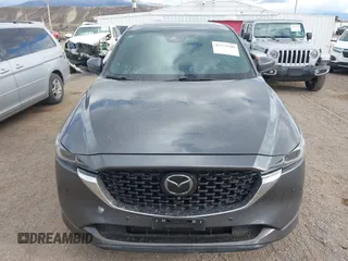 2023 Mazda CX-5 Signature with VIN JM3KFBXY9P0102087, listed as a IAAI auction lot 41771949 with 35,610 mi miles and . Bid and sale history available at carsss.com. Image 12.