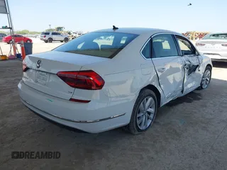 2018 Volkswagen Passat SE with VIN 1VWBA7A30JC052183, listed as a IAAI auction lot 42019565 with 105,743 mi miles and . Bid and sale history available at DreamBid. Image 4.