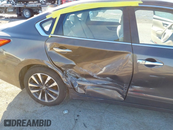 2016 Nissan Altima SV with VIN 1N4AL3AP3GC131740, listed as a IAAI auction lot 41630139 with 103,181 mi miles and . Bid and sale history available at DreamBid. Image 12.