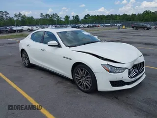 2018 Maserati Ghibli with VIN ZAM57XSA8J1295193, listed as a IAAI auction lot 42147050 with 75,465 mi miles and . Bid and sale history available at DreamBid. Image 1.