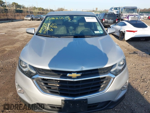 2018 Chevrolet Equinox LT with VIN 2GNAXSEV7J6336289, listed as a IAAI auction lot 42021056 with 94,998 mi miles and . Bid and sale history available at carsss.com. Image 12.