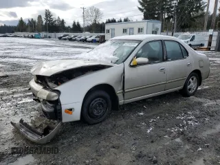 1996 Nissan Altima XE z VIN 1N4BU31D3TC157434, wystawiony jako Copart lot #42550935 z przebiegiem 240 645 mil mil oraz Szkoda całkowita • Salvage title. Historia ofert i sprzedaży dostępna na DreamBid. Obrazek 1.