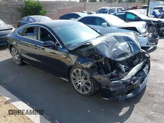 2014 Audi A7 Prestige with VIN WAU2GAFC5EN012583, listed as a IAAI auction lot 42561824 with Not provided miles and . Bid and sale history available at DreamBid. Image 1.