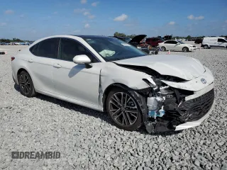 2025 Toyota Camry LE z VIN 4T1DAACK8SU068409, wystawiony jako Copart lot #51927985 z przebiegiem 9603 mil mil oraz Nie do naprawy • Non repairable. Historia ofert i sprzedaży dostępna na DreamBid. Obrazek 4.