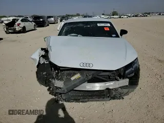 2018 Audi TT z VIN TRUC5AFV3J1001815, wystawiony jako Copart lot #49773065 z przebiegiem Nie podano mil oraz Szkoda całkowita • Salvage title. Historia ofert i sprzedaży dostępna na DreamBid. Obrazek 11.