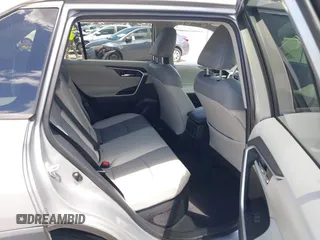2021 Toyota RAV4 Hybrid LE with VIN 2T3B6RFV2MW018967, listed as a IAAI auction lot 42601989 with 71,046 mi miles and . Bid and sale history available at DreamBid. Image 8.