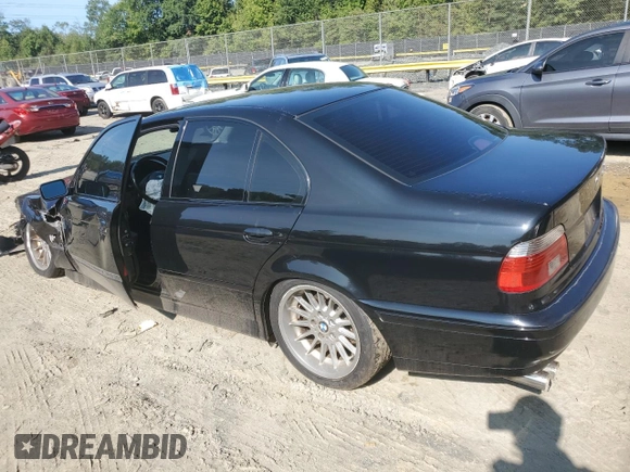 2002 BMW 5 Series 540i with VIN WBADN53412GF70808, listed as a Copart auction lot 69833574 with 193,044 mi miles and Salvage Title. Bid and sale history available at carsss.com. Image 2.