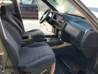 1997 Jeep Grand Cherokee Laredo with VIN 1J4GZ58S1VC603868, listed as a IAAI auction lot 42467813 with 297,306 mi miles and . Bid and sale history available at DreamBid. Image 5.