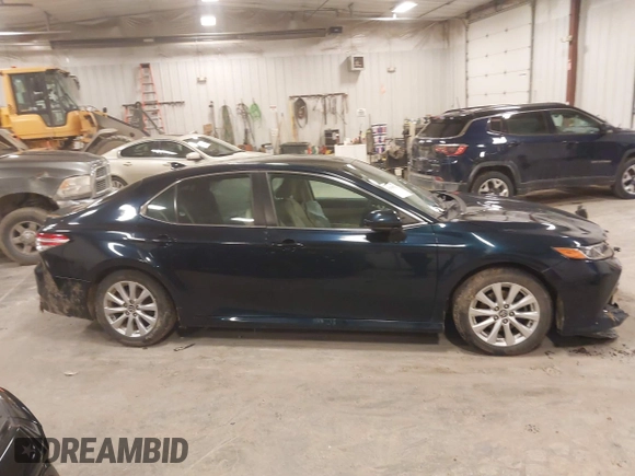 2020 Toyota Camry LE with VIN 4T1C11AK5LU926564, listed as a IAAI auction lot 41864812 with 104,212 mi miles and . Bid and sale history available at carsss.com. Image 13.