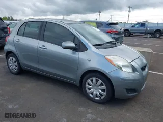 2009 Toyota Yaris with VIN JTDKT903295237216, listed as a IAAI auction lot 42087676 with 158,341 mi miles. Bid and sale history available at carsss.com. Image 1.