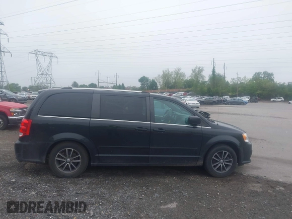 2017 Dodge Grand Caravan SXT with VIN 2C4RDGCG5HR790913, listed as a IAAI auction lot 42176310 with 149,987 mi miles and . Bid and sale history available at DreamBid. Image 13.