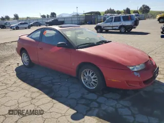 1999 Saturn SC with VIN 1G8ZY127XXZ314531, listed as a Copart auction lot 49653805 with 130,457 mi miles and Salvage Title. Bid and sale history available at carsss.com. Image 4.