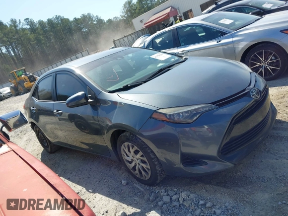 2019 Toyota Corolla L with VIN 2T1BURHE4KC134729, listed as a IAAI auction lot 41779629 with 240,685 mi miles. Bid and sale history available at carsss.com. Image 13.