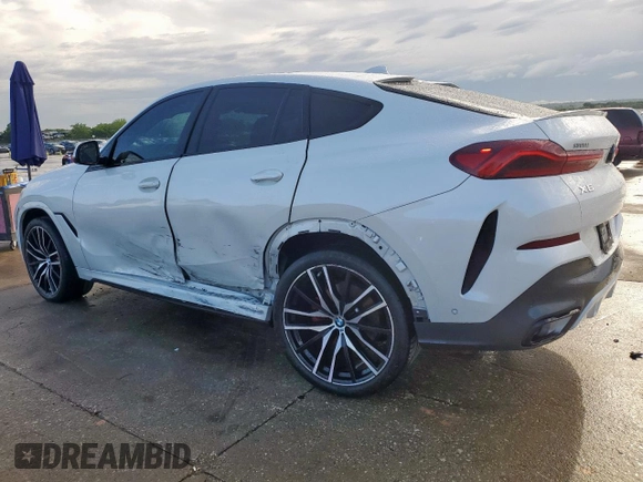 2023 BMW X6 xDrive40i z VIN 5UXCY6C08P9N43749, wystawiony jako Copart lot #54092795 z przebiegiem 39 495 mil mil oraz Szkody całkowita. Historia ofert i sprzedaży dostępna na DreamBid. Obrazek 2.