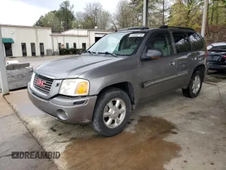 2005 GMC Envoy SLE with VIN 1GKDS13S752245165, listed as a Copart auction lot 51343715 with 177,186 mi miles and Salvage Title. Bid and sale history available at carsss.com. Image 1.