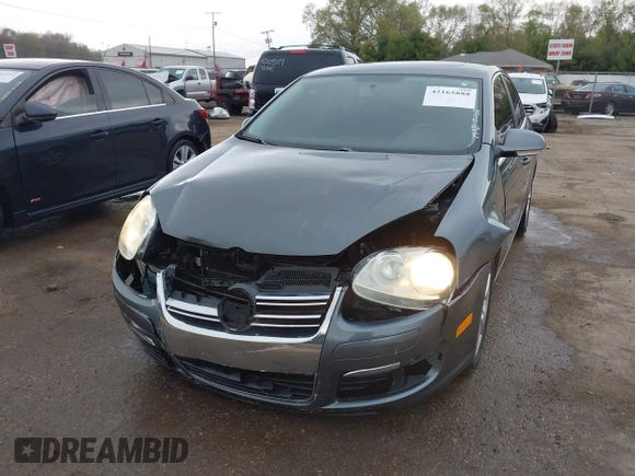 2008 Volkswagen Jetta SE z VIN 3VWRM71K18M135790, wystawiony jako IAAI lot #42165888 z przebiegiem 147 523 mil mil oraz . Historia ofert i sprzedaży dostępna na DreamBid. Obrazek 6.