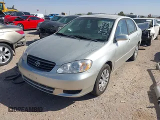 2004 Toyota Corolla CE with VIN 1NXBR32E64Z283247, listed as a IAAI auction lot 42121254 with 292,754 mi miles. Bid and sale history available at carsss.com. Image 2.
