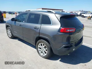 2014 Jeep Cherokee Latitude with VIN 1C4PJMCS2EW137767, listed as a IAAI auction lot 42052071 with 165,300 mi miles and . Bid and sale history available at DreamBid. Image 3.