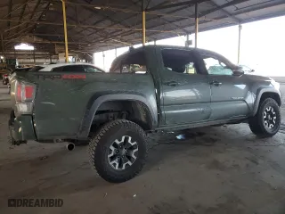 2022 Toyota Tacoma 4WD SR with VIN 3TYCZ5AN0NT055986, listed as a Copart auction lot 50165995 with 52,628 mi miles and Salvage Title. Bid and sale history available at carsss.com. Image 3.