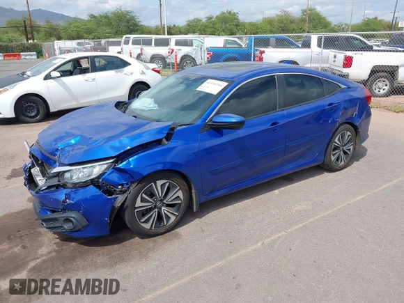 2018 Honda Civic EX-T z VIN JHMFC1F31JX018152, wystawiony jako IAAI lot #41935394 z przebiegiem 60 333 mil mil oraz . Historia ofert i sprzedaży dostępna na DreamBid. Obrazek 17.