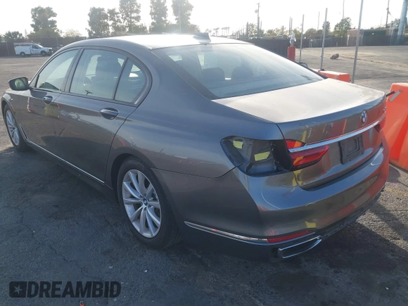 2018 BMW 7 Series 740i with VIN WBA7E2C55JB214987, listed as a IAAI auction lot 41733790 with 96,738 mi miles. Bid and sale history available at carsss.com. Image 3.