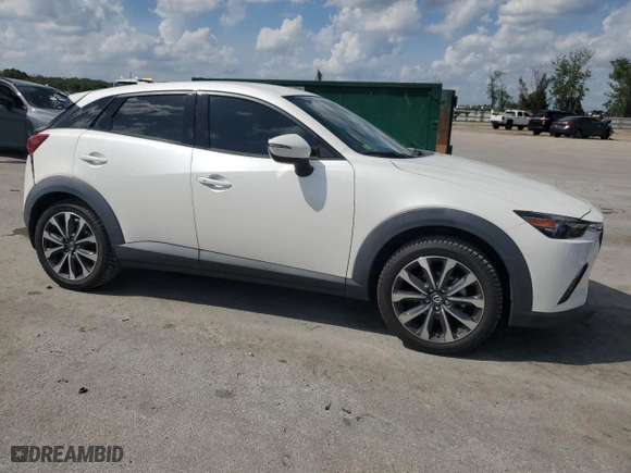 2019 Mazda CX-3 Touring with VIN JM1DKDC78K1446163, listed as a Copart auction lot 50961685 with 65,611 mi miles and Salvage Title. Bid and sale history available at carsss.com. Image 4.