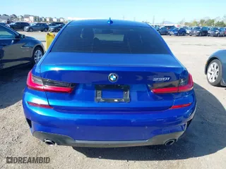 2020 BMW 3 Series 330i with VIN WBA5R1C05LFH66384, listed as a IAAI auction lot 41810255 with 59,433 mi miles. Bid and sale history available at carsss.com. Image 16.
