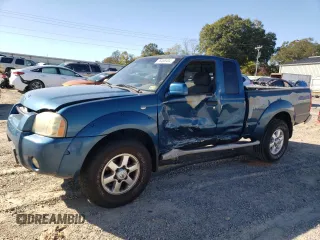 2003 Nissan Frontier XE z VIN 1N6ED26Y93C468148, wystawiony jako Copart lot #76468404 z przebiegiem 178 257 mil mil oraz Szkoda całkowita • Salvage title. Historia ofert i sprzedaży dostępna na DreamBid. Obrazek 1.