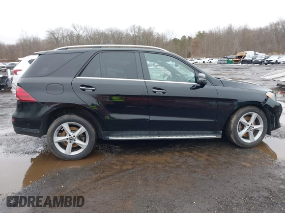 2019 Mercedes-Benz GLE 400 with VIN 4JGDA5GB3KB207679, listed as a IAAI auction lot 41556577 with 199,755 mi miles and . Bid and sale history available at DreamBid. Image 13.