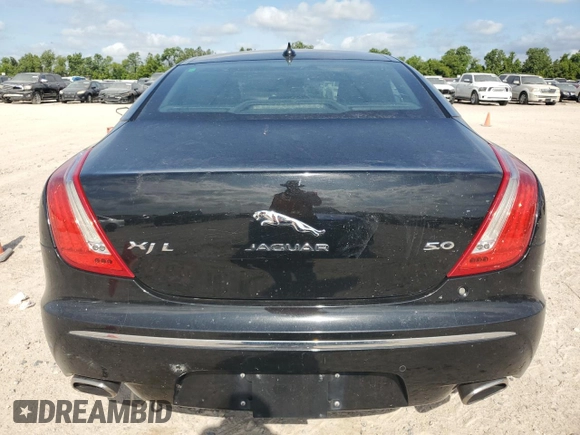 2014 Jaguar XJ with VIN SAJWA2GT0EMV61531, listed as a Copart auction lot 61071054 with 79,266 mi miles and Clean Title. Bid and sale history available at DreamBid. Image 6.