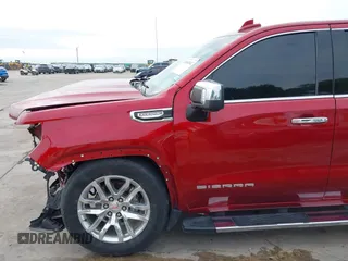 2021 GMC Sierra 1500 SLT z VIN 3GTU9DED2MG153183, wystawiony jako IAAI lot #41880942 z przebiegiem 84 686 mil mil oraz . Historia ofert i sprzedaży dostępna na DreamBid. Obrazek 19.