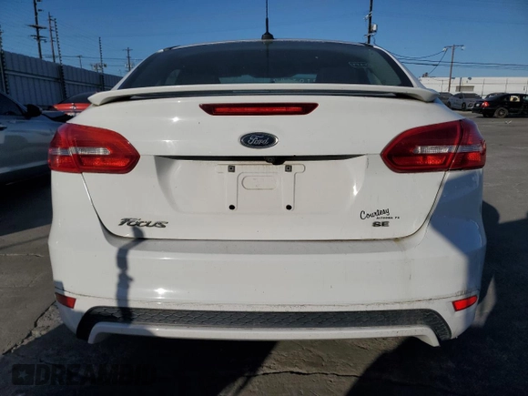 2016 Ford Focus SE with VIN 1FADP3F26GL336032, listed as a Copart auction lot 55963715 with 107,527 mi miles and Clean title. Bid and sale history available at DreamBid. Image 6.