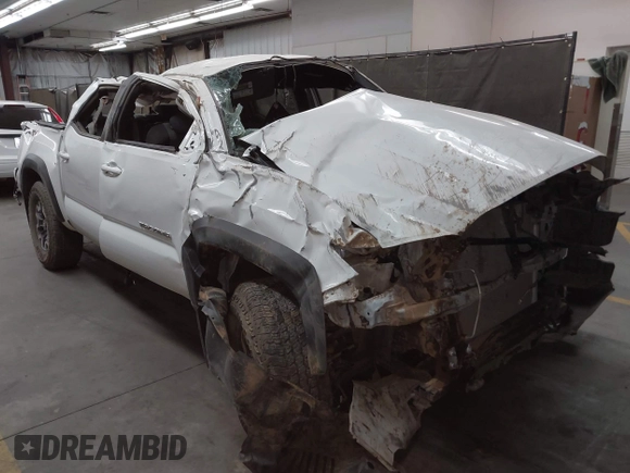 2023 Toyota Tacoma SR with VIN 3TMCZ5ANXPM652495, listed as a IAAI auction lot 42375230 with 26,736 mi miles and . Bid and sale history available at DreamBid. Image 1.