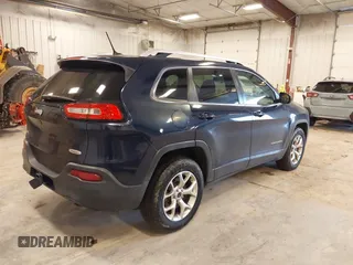 2014 Jeep Cherokee Latitude with VIN 1C4PJMCS9EW239549, listed as a IAAI auction lot 41156954 with 167,331 mi miles and . Bid and sale history available at DreamBid. Image 4.