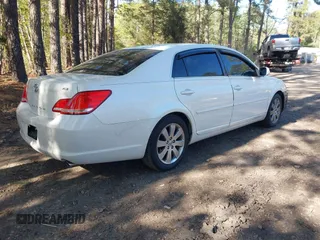 2007 Toyota Avalon XL with VIN 4T1BK36B67U219198, listed as a IAAI auction lot 41993471 with 127,139 mi miles. Bid and sale history available at carsss.com. Image 4.