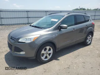 2014 Ford Escape SE z VIN 1FMCU9G97EUB12879, wystawiony jako Copart lot #60281735 z przebiegiem Nie podano mil oraz Szkoda całkowita • Salvage title. Historia ofert i sprzedaży dostępna na DreamBid. Obrazek 1.